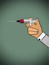 Hand holding coronavirus vaccine syringe