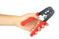 Hand holding crimping cutting tool Royalty Free Stock Photo