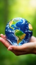 Hand holding crystal earth globe. Earth Day. Environment day, save clean planet, ecology concept. Royalty Free Stock Photo