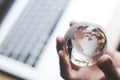 Hand holding crystal world. business symbol Royalty Free Stock Photo