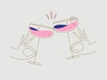 Hand holding daiquiri clink glasses beige