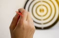 Hand holding Dart trowing to dartboard Royalty Free Stock Photo