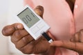 Hand Holding Device For Measuring Blood Sugar Royalty Free Stock Photo