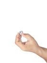 Hand holding diamond ring isolated on white background Royalty Free Stock Photo