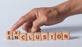 Dice with text for illustration of `exclusion versus inclusion` words Royalty Free Stock Photo