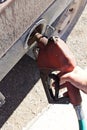 Hand Holding Diesel Fuel Pump Royalty Free Stock Photo