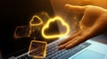 Hand holding digital cloud data over laptop Royalty Free Stock Photo