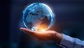 Hand holding digital globe surrounded by network connections