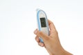 Hand holding digital thermometer Royalty Free Stock Photo