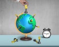 Hand holding dollar chess on 3d map globe with clock