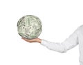 Hand holding dollars ball Royalty Free Stock Photo
