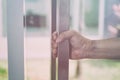 hand holding door knob, opening door, selective focus Royalty Free Stock Photo