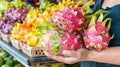 Hand holding dragon fruit with selection on blurred background, copy space for text Royalty Free Stock Photo