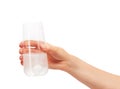 Hand holding drinking glass with tablet dissolving in water Royalty Free Stock Photo