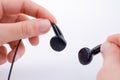 Hand holding earphone Royalty Free Stock Photo