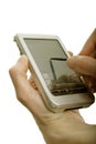 Hand holding electronic organizer Royalty Free Stock Photo
