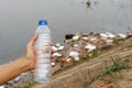 Plastic garbage in the river , pollution and environment in the water Royalty Free Stock Photo