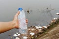 Plastic garbage in the river , pollution and environment in the water Royalty Free Stock Photo