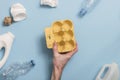 Hand holding empty egg box recycling rubbish Royalty Free Stock Photo
