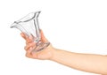 Hand holding a empty glass piala