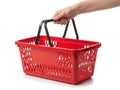 Hand holding empty shopping basket Royalty Free Stock Photo