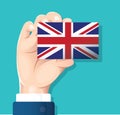 Hand holding England flag card with blue background. vector illustration eps10 Royalty Free Stock Photo