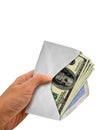 Hand Holding Envelope with Cash