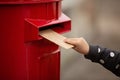 Hand holding envelope. Voting by Mail for absentee ballot or mail-in voting in the presidential election during coronavirus covid- Royalty Free Stock Photo