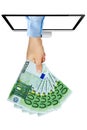 Hand holding Euro Banknotes from computer screen Royalty Free Stock Photo