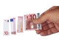 Hand holding euro money bill cut into pieces. Inflation concept Royalty Free Stock Photo