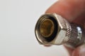 Hand holding faucet connector Royalty Free Stock Photo