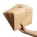 Hand holding file folders stack isolated on white background Royalty Free Stock Photo