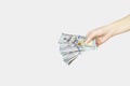 A hand holding five 100 bills, concept of investment, success and profitable Royalty Free Stock Photo