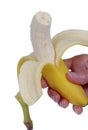 Hand holding a fresh banana