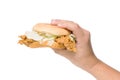 Hand holding a fried chicken burger isolate on white Royalty Free Stock Photo