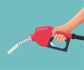 Hand is holding fuel nozzle pump Royalty Free Stock Photo