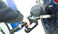 Hand holding fuel pump Royalty Free Stock Photo