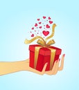 Hand holding gift Royalty Free Stock Photo