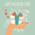 Hand holding a gift box with hearts coming out, decoration and typographic message. Colorful hand drawn illustration