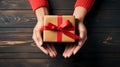 Hand holding gift box for seasonal present, top view, flat lay, AI generated, generative AI