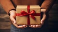 Hand holding gift box for seasonal present, top view, flat lay, AI generated, generative AI