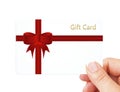 Hand holding gift card isolated over white Royalty Free Stock Photo