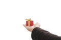 Hand holding, giving or receiving gift box, isolated on white background