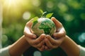 Hand holding glass globe ball with tree growing and green nature blur background. eco concept. Generative Ai Royalty Free Stock Photo