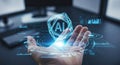 Hand holding glowing AI icon with digital interface elements Royalty Free Stock Photo