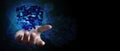 Hand holding a glowing blue abstract digital data cube with ethereal light effects isolated on white background Royalty Free Stock Photo