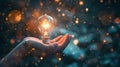 Hand holding glowing light bulb, concept for new ideas, innovation and inspiration Royalty Free Stock Photo