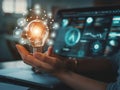 Hand Holding Glowing Light Bulb with Digital Network Royalty Free Stock Photo