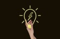 Hand holding glowing light bulb. New idea, breakthrough, inspiration, finding solution from difficult situation concept Royalty Free Stock Photo