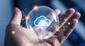 Hand holding glowing sphere with cloud computing icon, for global network connection, data storage, digital Royalty Free Stock Photo